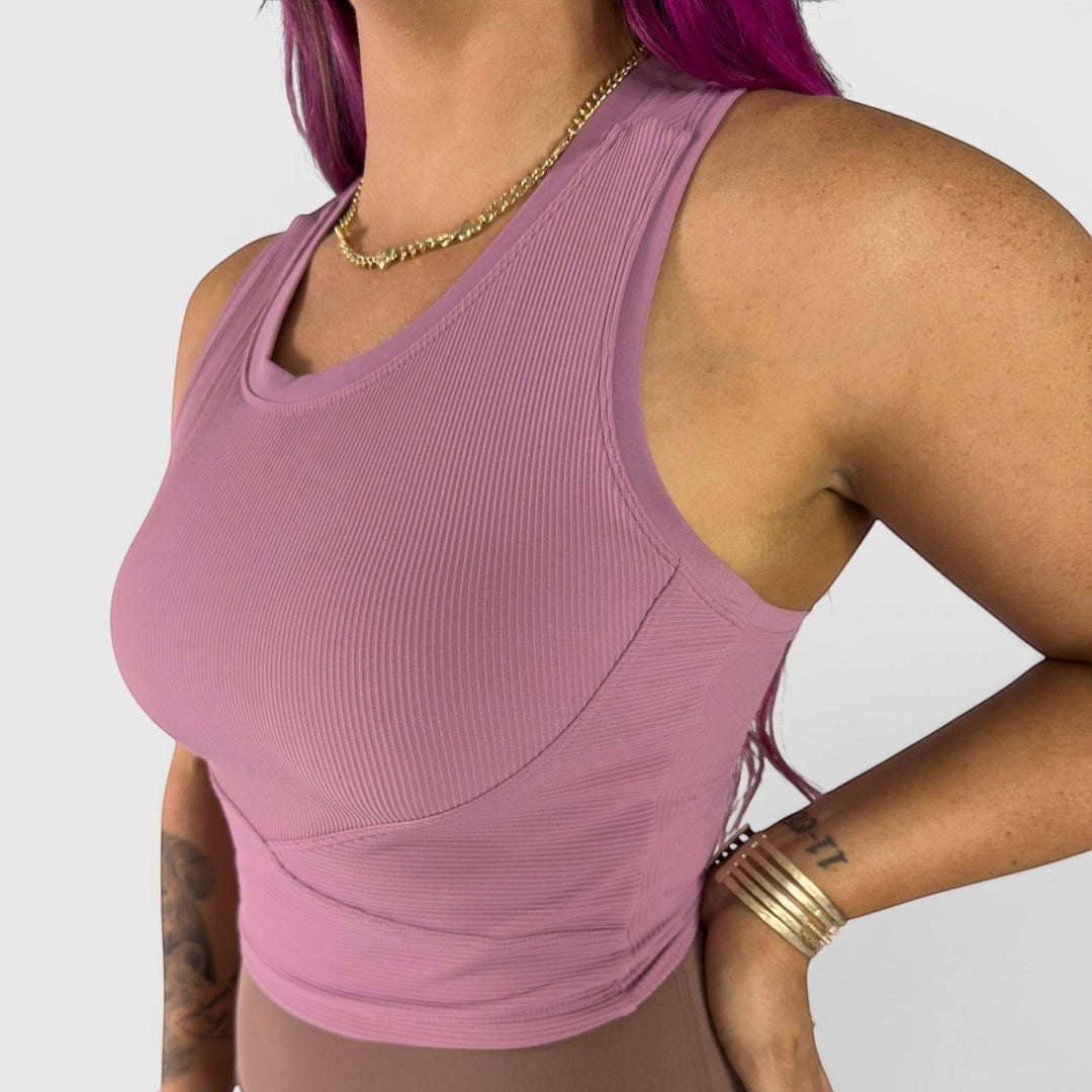 MBS | The Woman Beyond The Cape velvet dust seamless ribbed bralette with razorback fit and crisscross front.