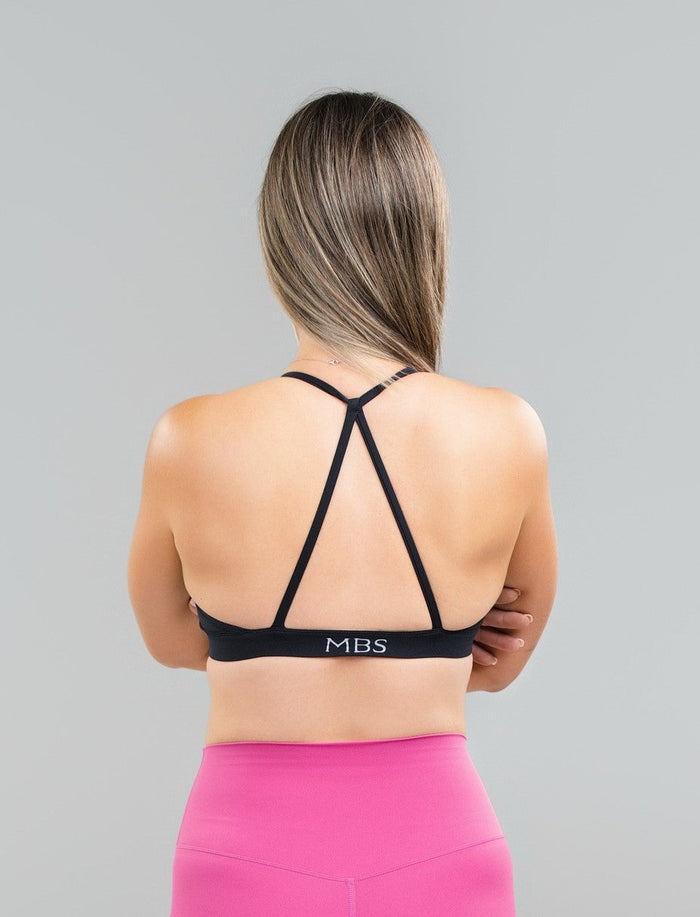 Back view of I Am Worthy Bralette in black showing halter straps and open-back detail


